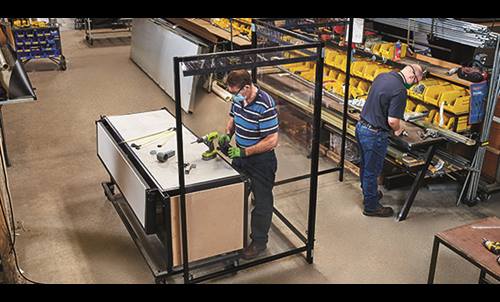 The CDC recommends installing physical barriers, such as clear plastic sneeze guards or employee separation barriers to prevent SARS-CoV-2 exposure.